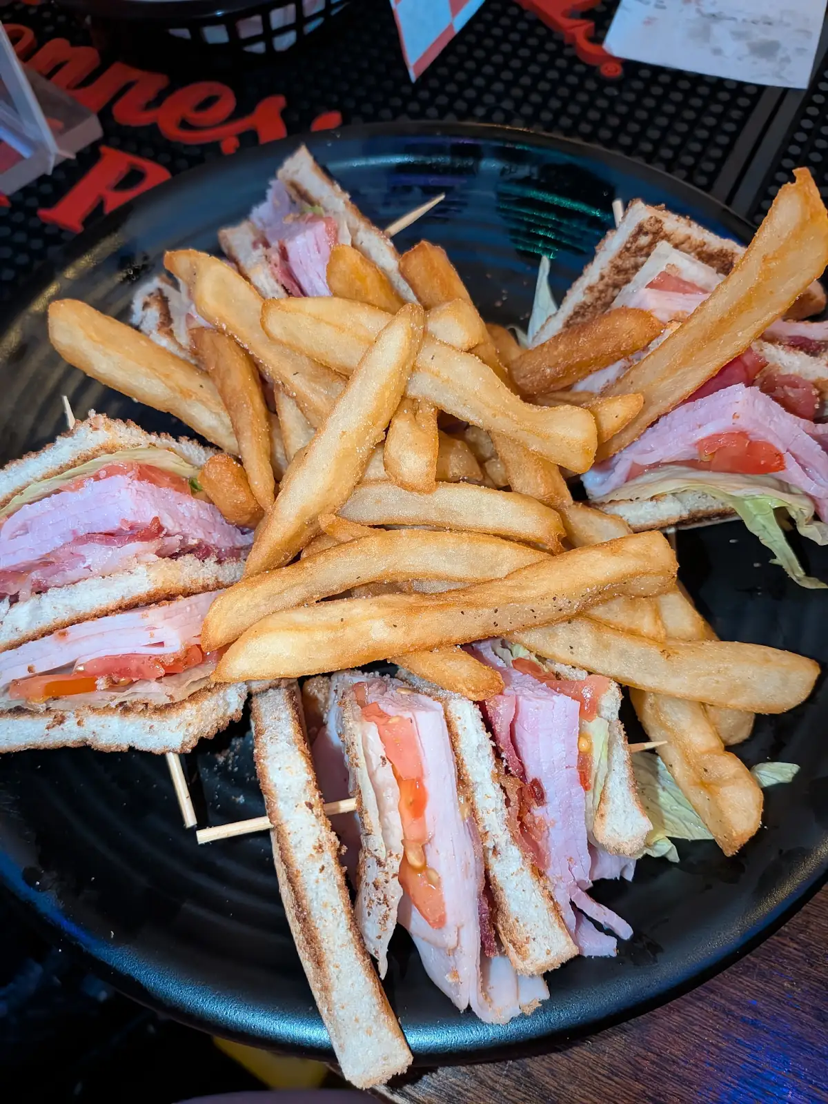 Club sandwich and fries